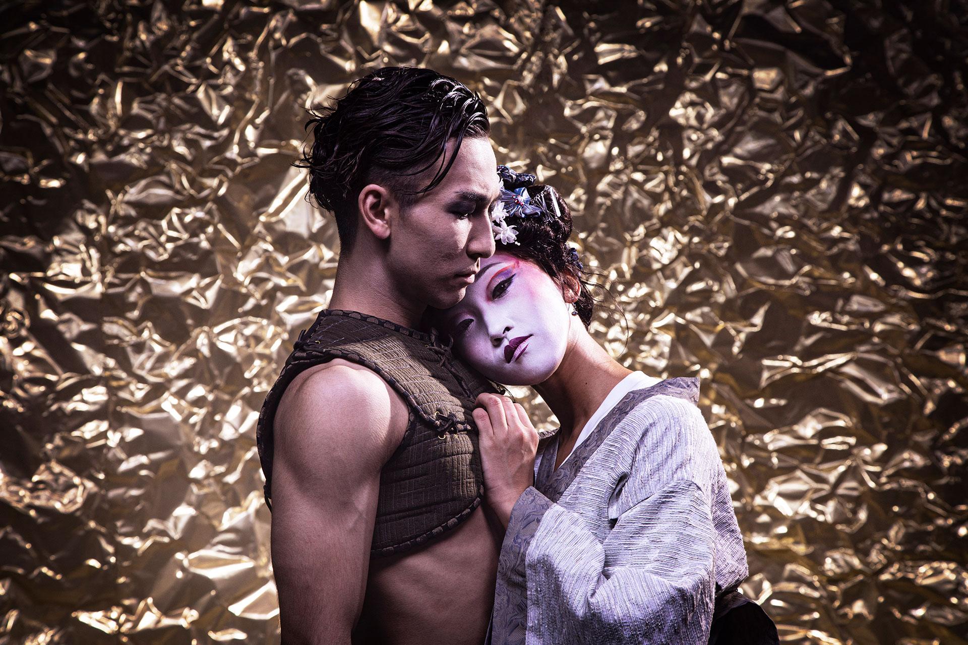 Riku Ito as a Samurai holds Geisha, Minju Kang, close. Photo Guy Farrow