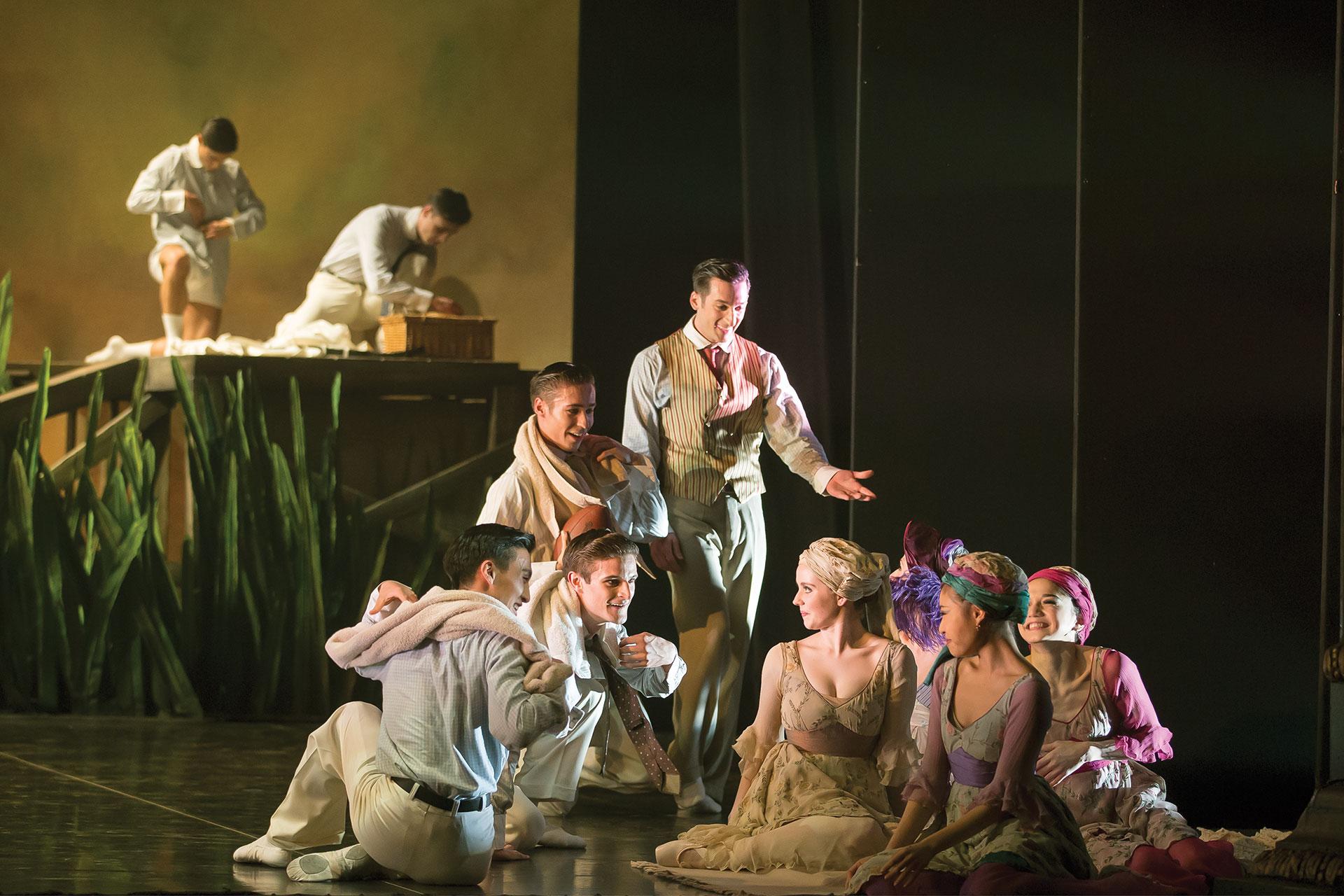 The party guests gather by the lake to cool off from the summer sun