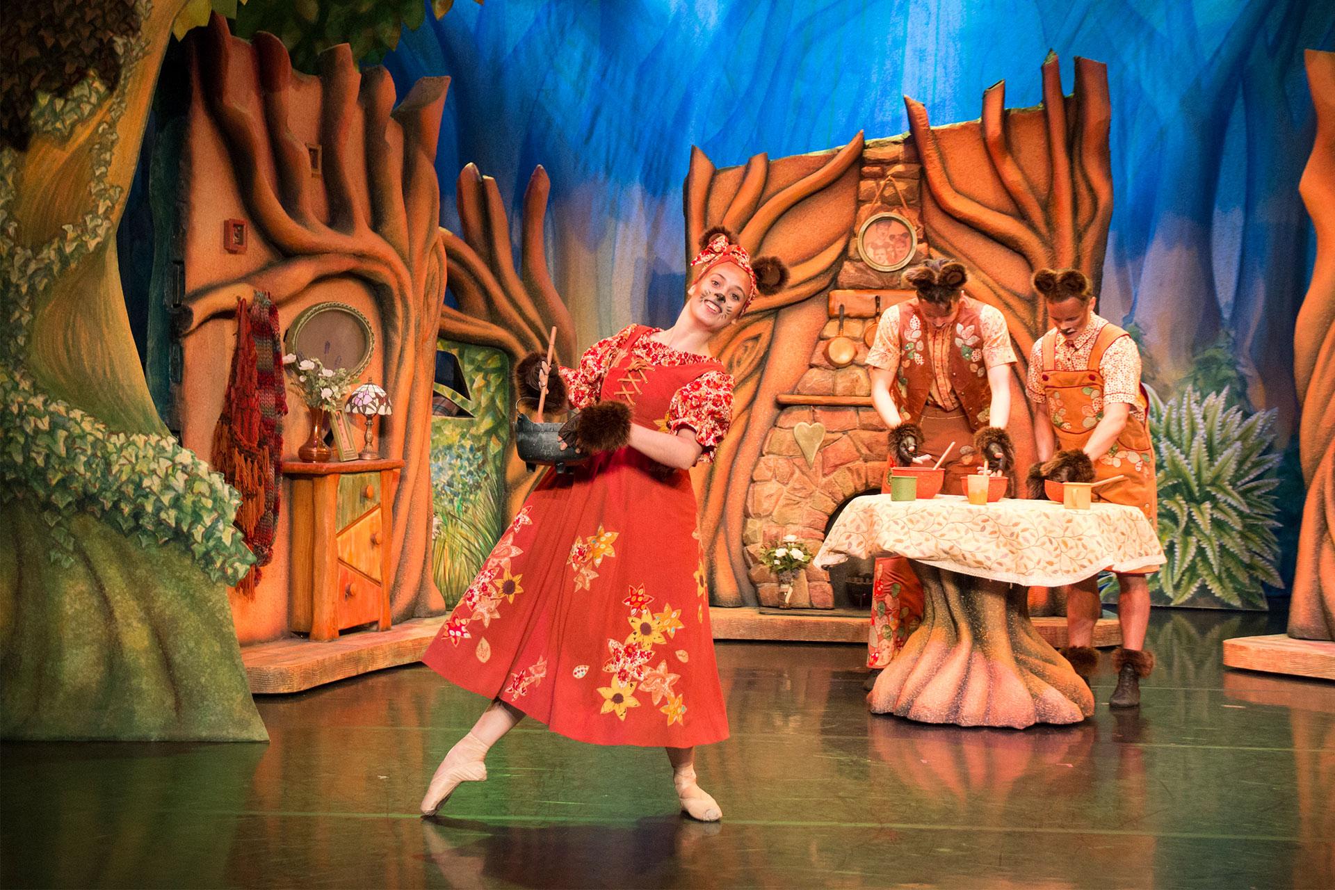 Mama Bear mixes the porridge just right