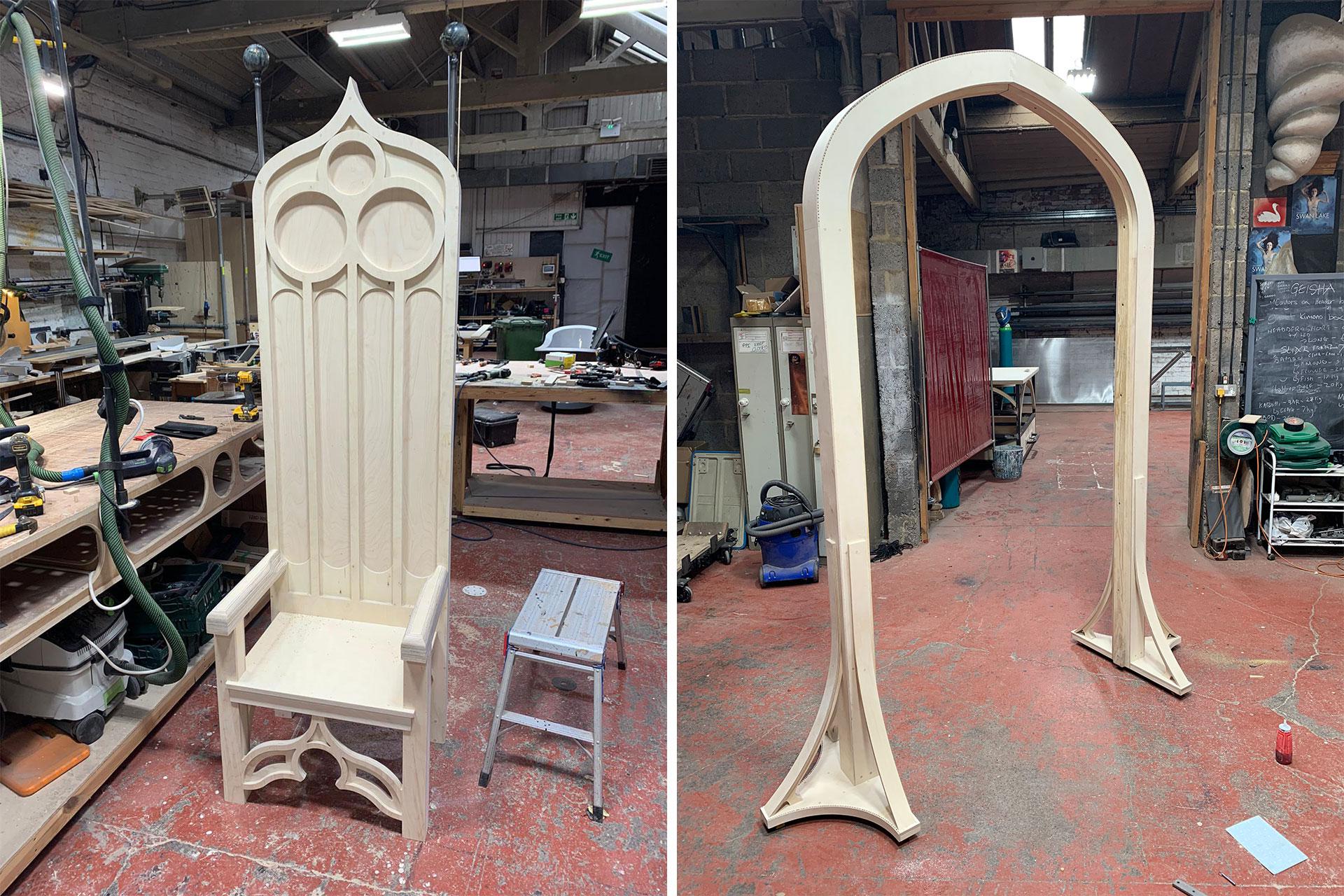 A throne and an arch under construction
