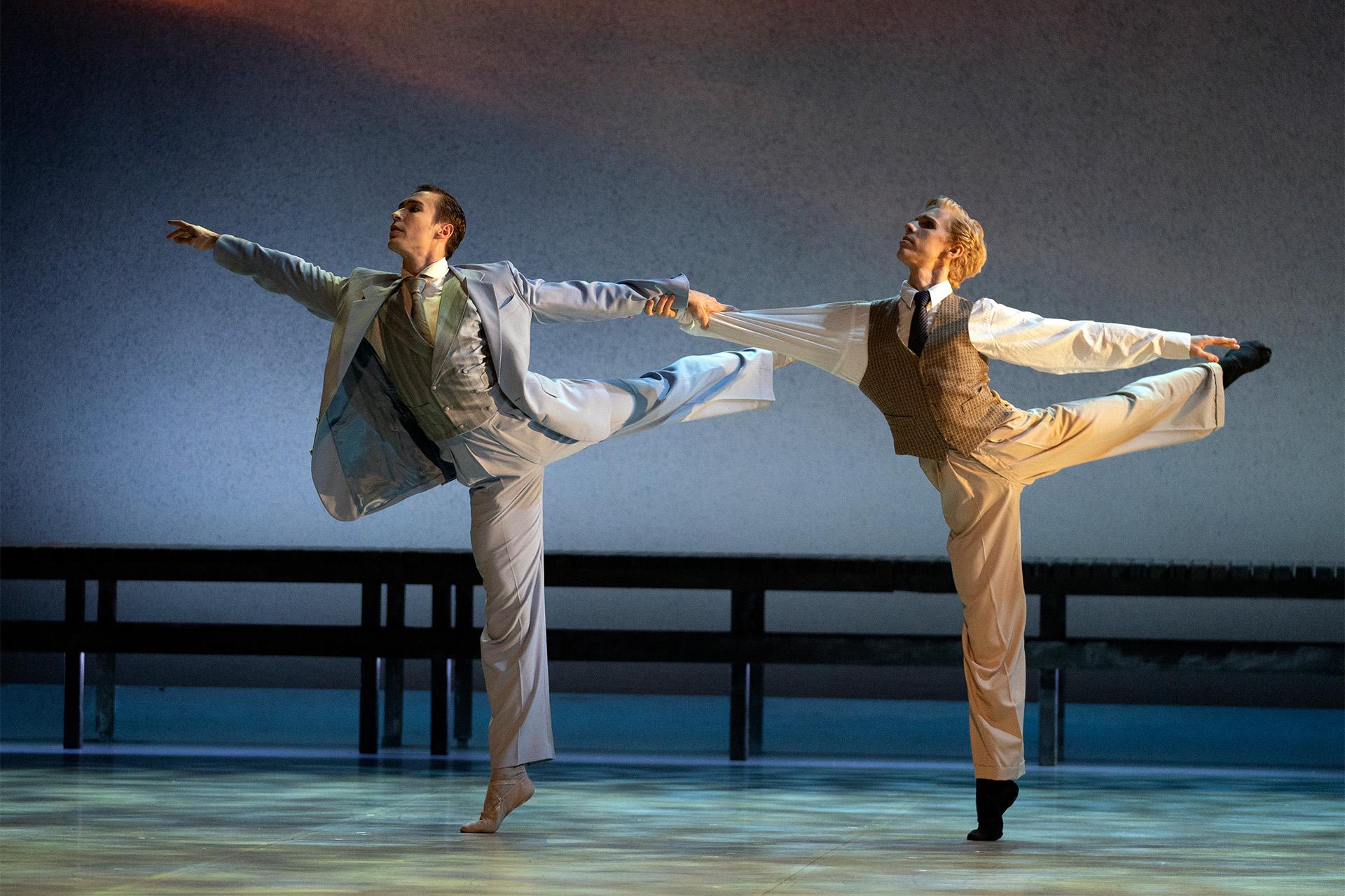 Jay and Nick standing on their toes in arabesque.