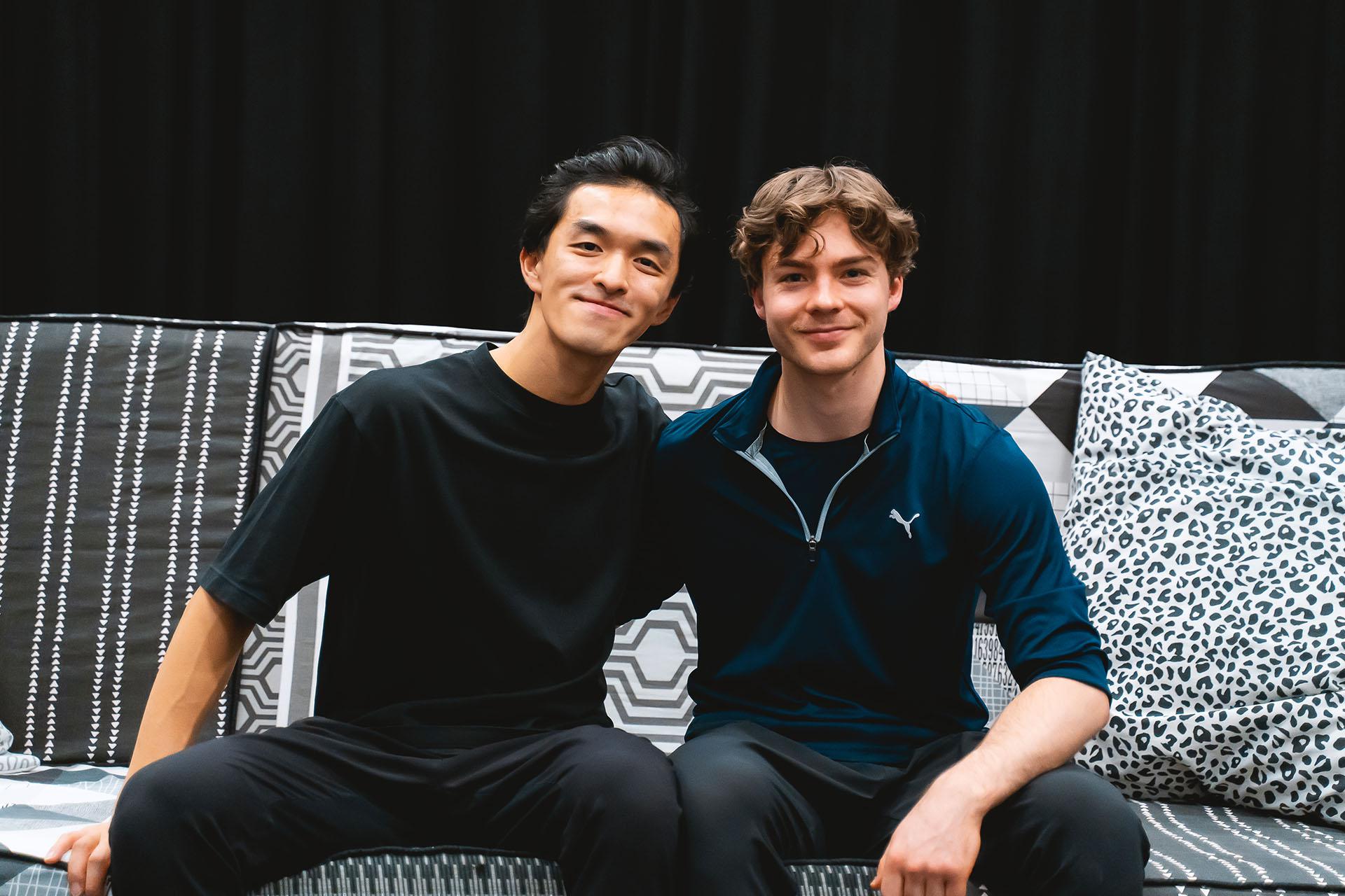 The two choreographers of Hansel &amp; Gretel, George Liang and Harris Beattie, sat on the sofa that features in the ballet, both smiling directly at the camera