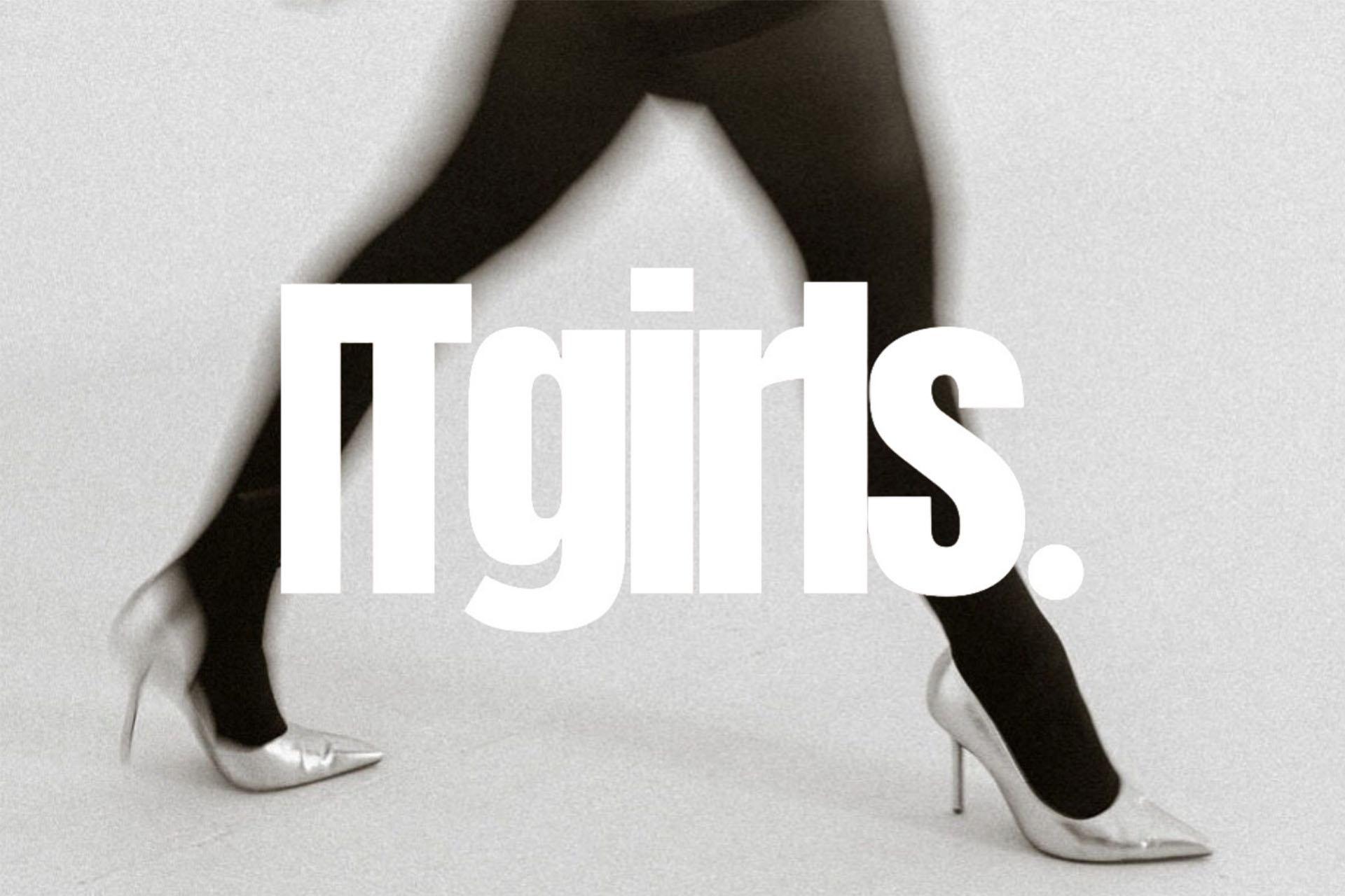 Legs wearing black tights and silver stilettos with the text 'ITgirls' in bold, white text over the entire image