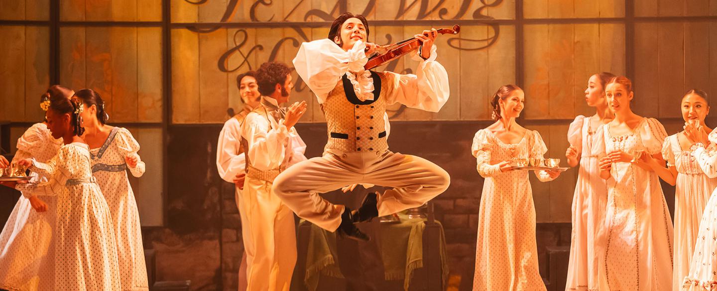 Dancer in Victorian dress, leaping high with a fiddle under his chin