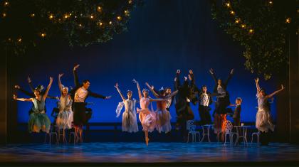 Dancers leaping in unison